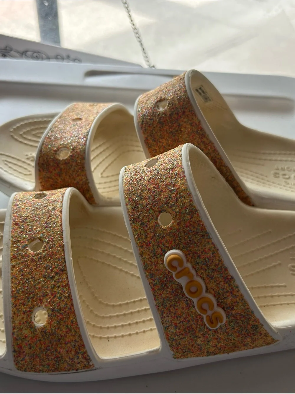 CROCS Cream Slide Sandals with Multicolor Glitter Straps - Picture 2 of 4